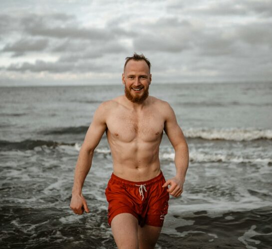 man getting out of the sea