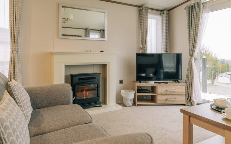 Oak holiday home fireplace tv