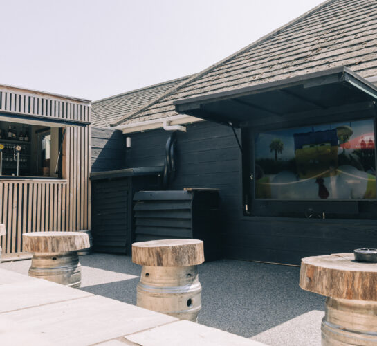 outdoor screen and bar at village inn