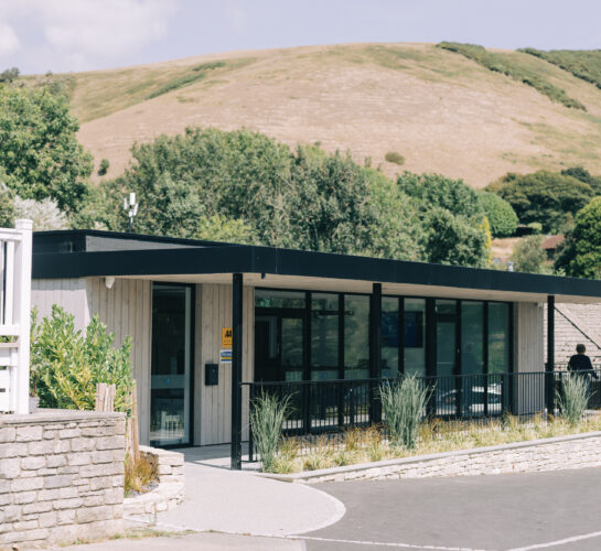ulwell reception building with purbeck hills in the background